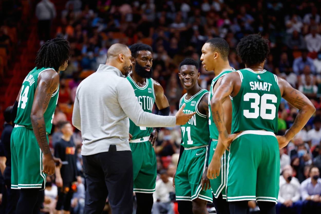 Head coach Ime Udoka of the Boston Celtics talks with his team.
