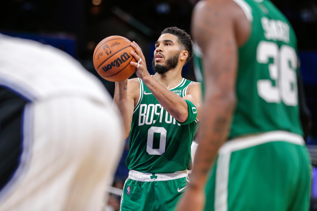 Jayson Tatum of the Boston Celtics shoots a free throw against the Orlando Magic.
