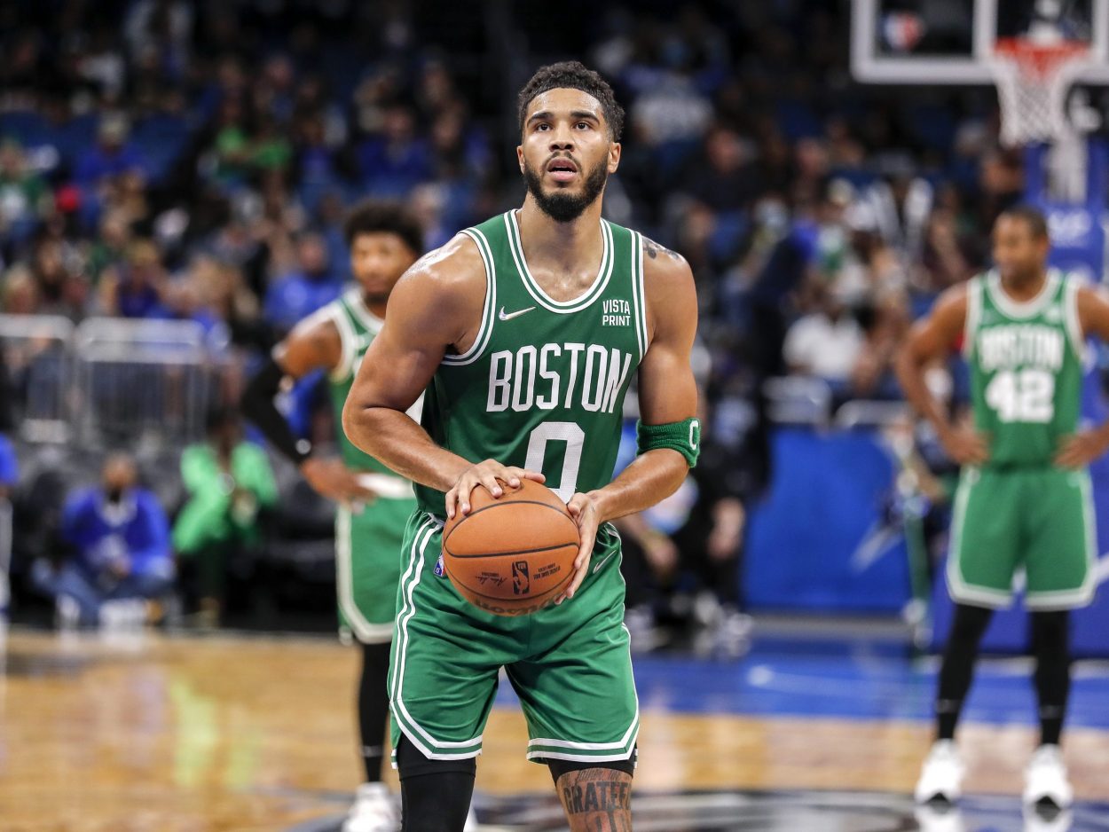 Boston Celtics star Jayson Tatum shoots a free throw during a game against the Orlando Magic