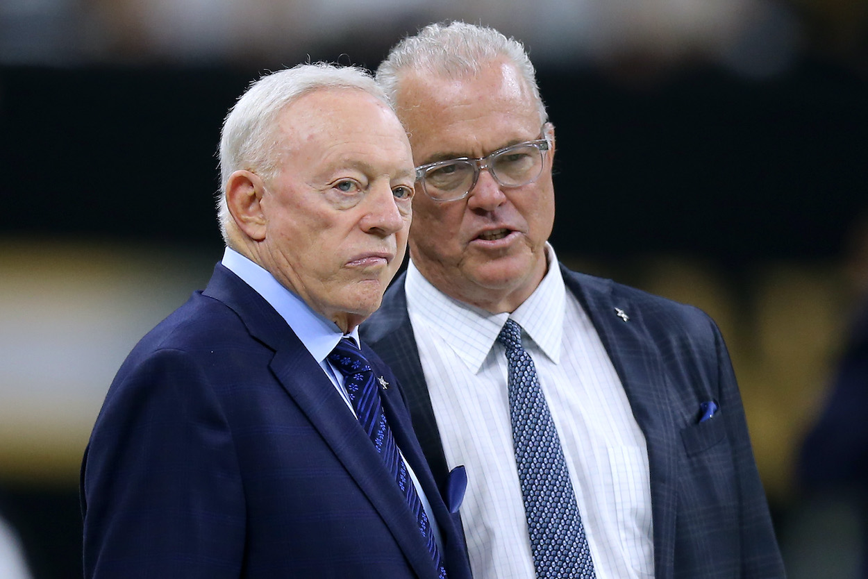 Owner Jerry Jones of the Dallas Cowboys and Executive Vice President Stephen Jones talk before a game against the New Orleans Saints at the Mercedes Benz Superdome on September 29, 2019 in New Orleans, Louisiana.