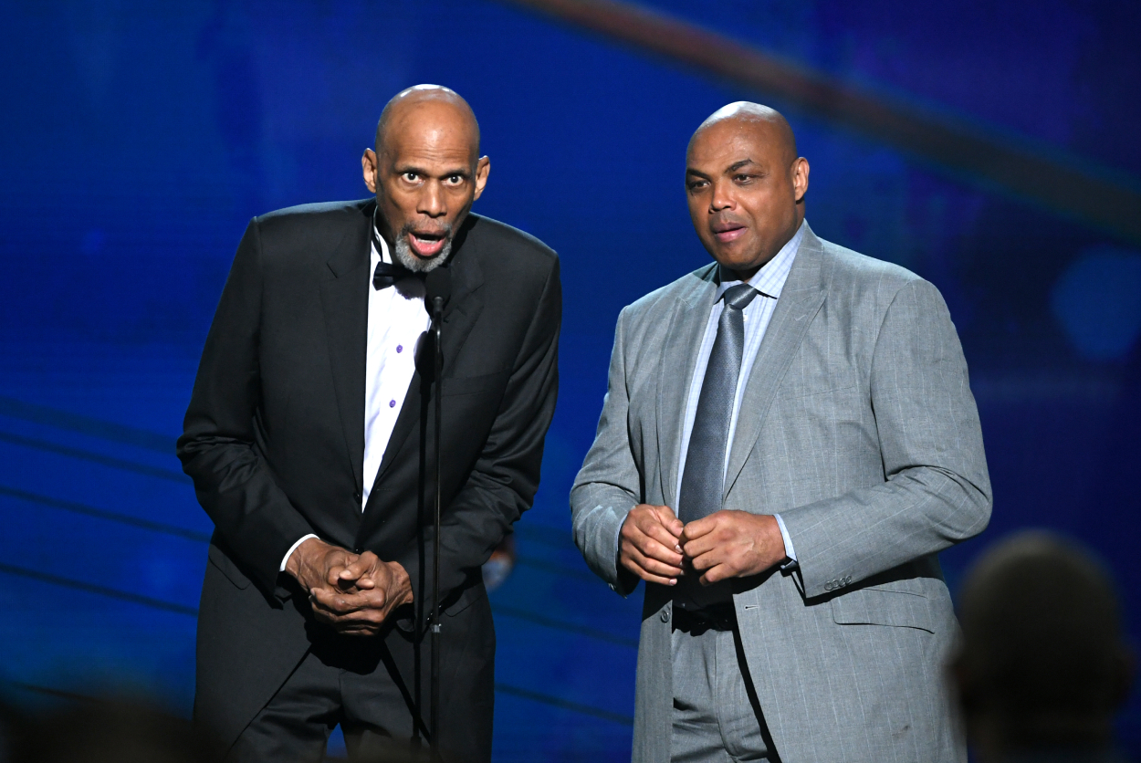 Kareem Abdul-Jabbar (L) and Charles Barkley speak onstage at the 2018 NBA Awards.