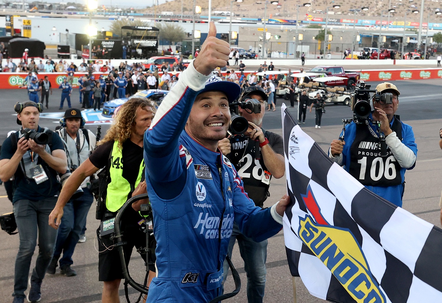 Kyle Larson, driver of the No. 5 Chevrolet, celebrates after winning the NASCAR Cup Series Championship at Phoenix Raceway on Nov. 7, 2021.