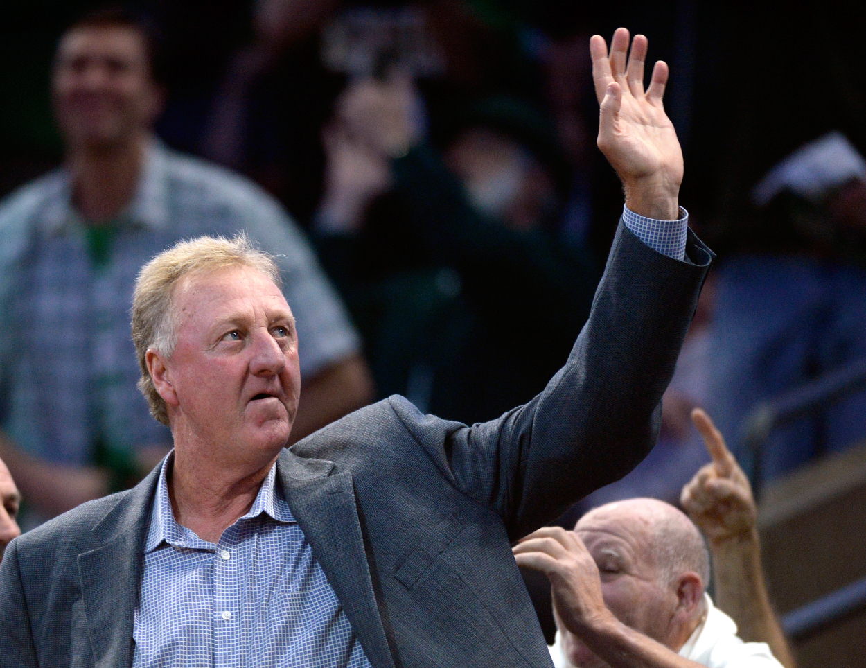 Boston Celtics legend Larry Bird acknowledges the crowd.