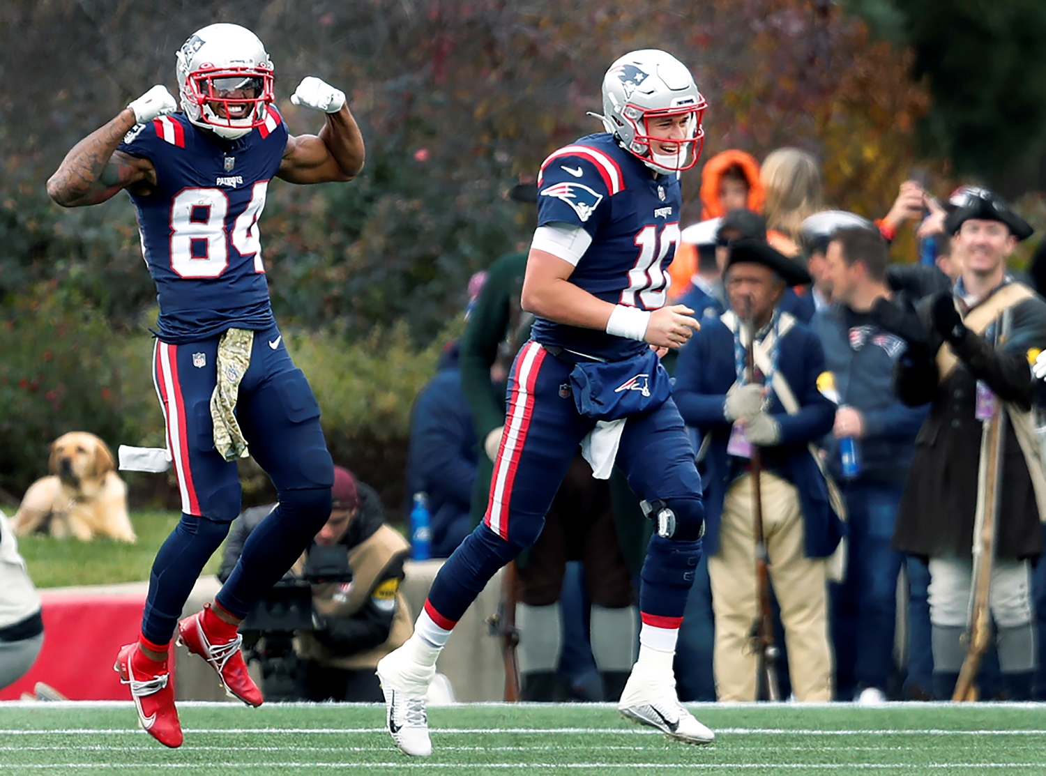 New England Patriots wide receiver Kendrick Bourne celebrates scoring a touchdown with rookie QB Mac Jones.