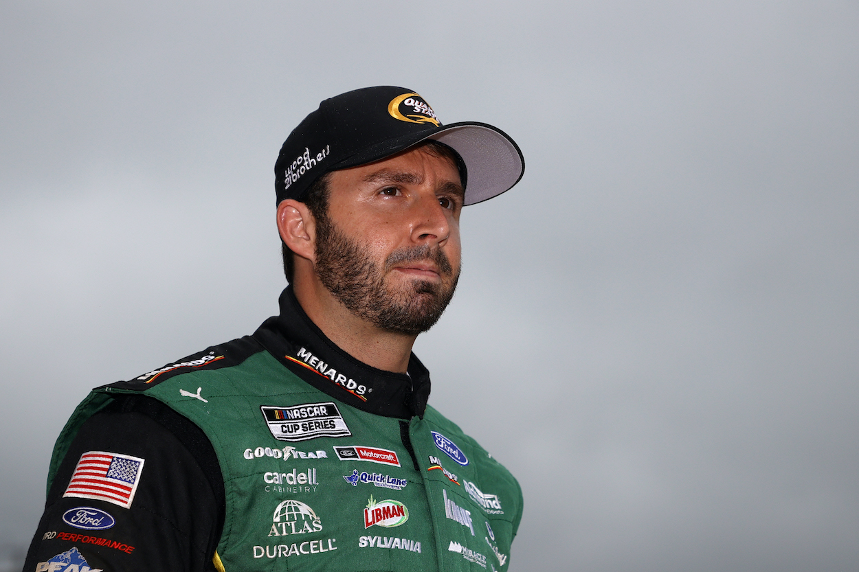 Matt DiBenedetto stands on grid before race