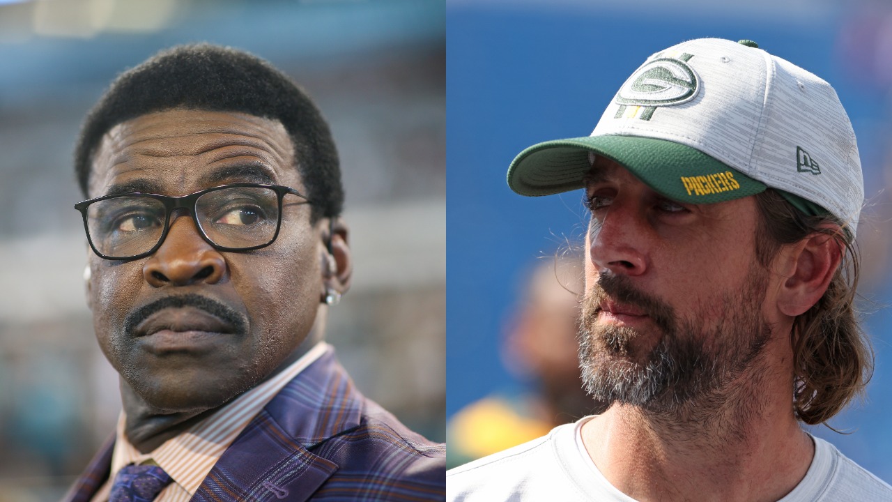 Michael Irvin looks on before an NFL game; Packers QB Aaron Rodgers looks on after game against the Bills