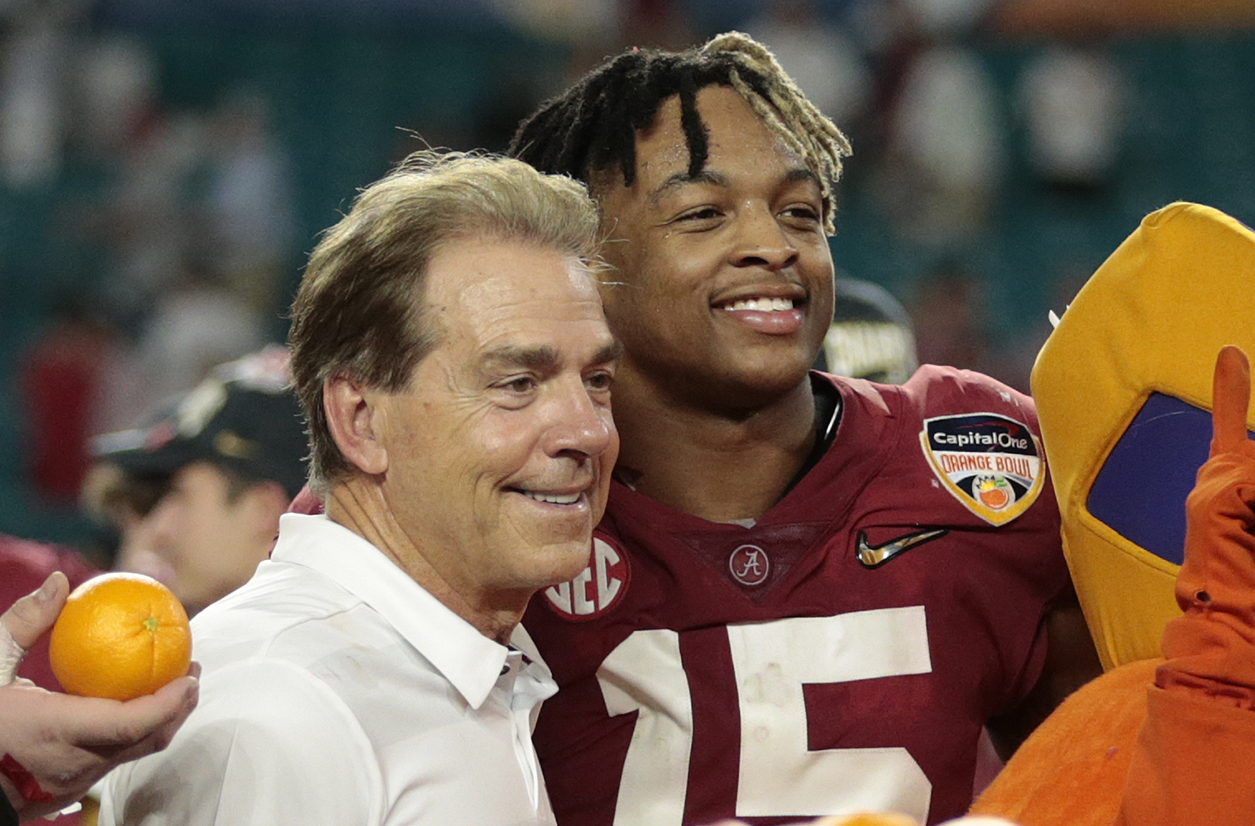 Alabama head coach Nick Saban (L) and safety Xavier McKinney in 2018. McKinney now plays for the New York Giants.