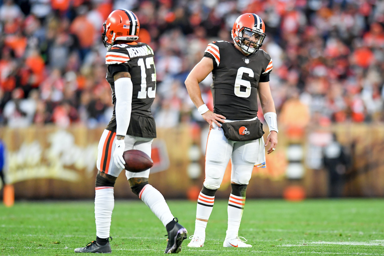 Baker Mayfield and Odell Beckham Jr. of the Cleveland Browns reacts to a flag in the fourth quarter against the Arizona Cardinals at FirstEnergy Stadium on October 17, 2021 in Cleveland, Ohio.
