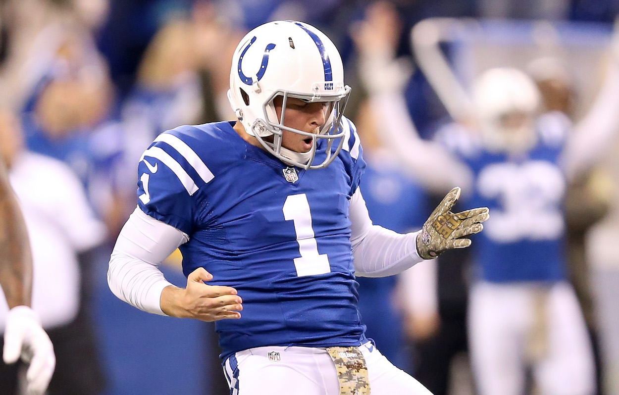 Pat McAfee of the Indianapolis Colts celebrates after the 55 yard field goal by Adam Vinatieri during the game against the Denver Broncos at Lucas Oil Stadium on November 8, 2015 in Indianapolis, Indiana.