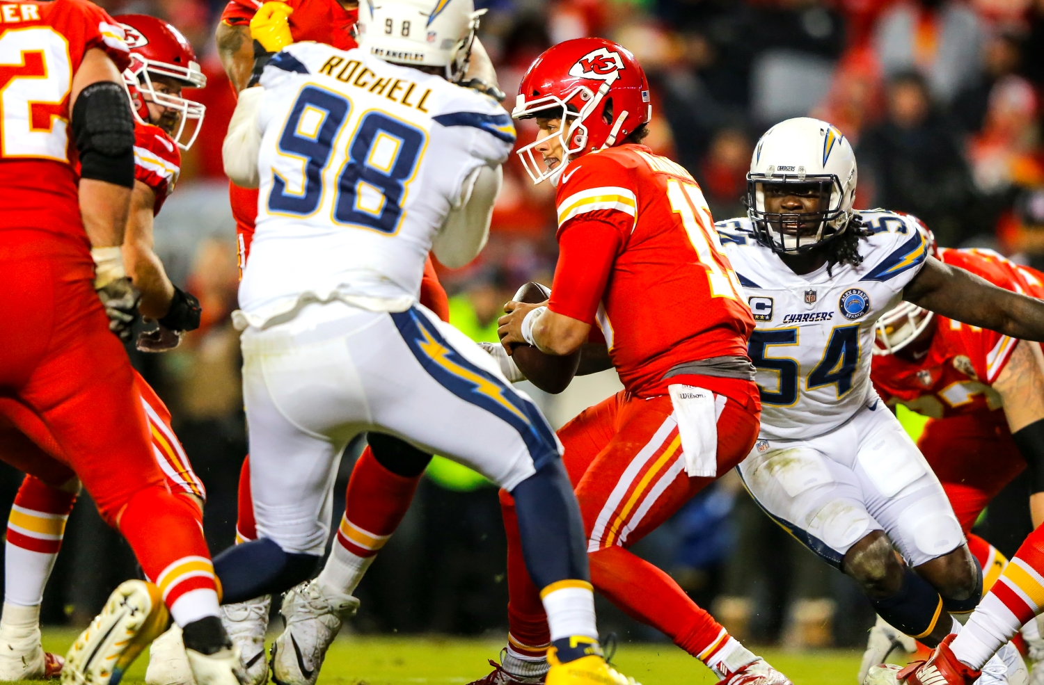 Kansas City Chiefs QB Patrick Mahomes is pressured by Los Angeles Chargers outside linebacker Melvin Ingram.