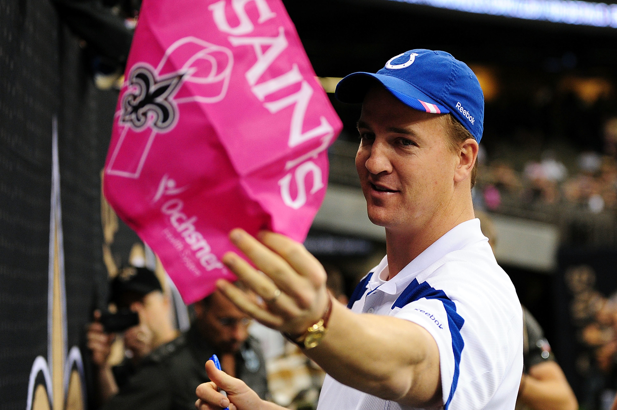 Indianapolis Colts legend Peyton Manning interacts with New Orleans Saints fans in 2011.