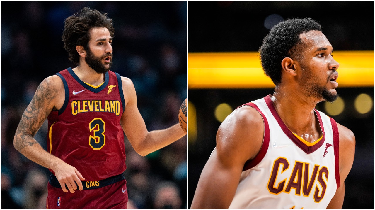 L-R: Cleveland Cavaliers guard Ricky Rubio dribbles the ball and Cavs rookie Evan Mobley looks on