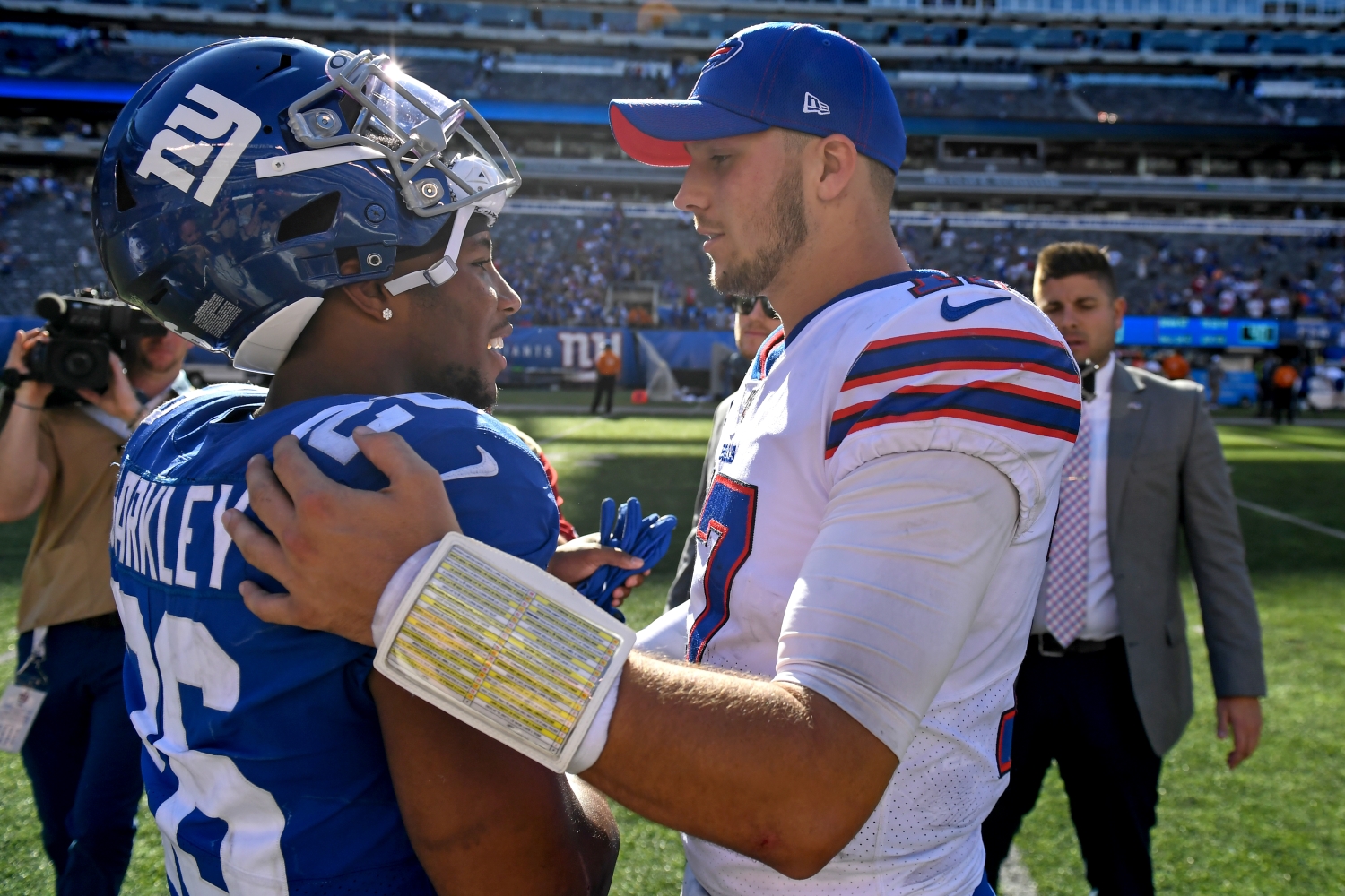 New York Giants running back Saquon Barkley and Buffalo Bills QB Josh Allen speak after a game.