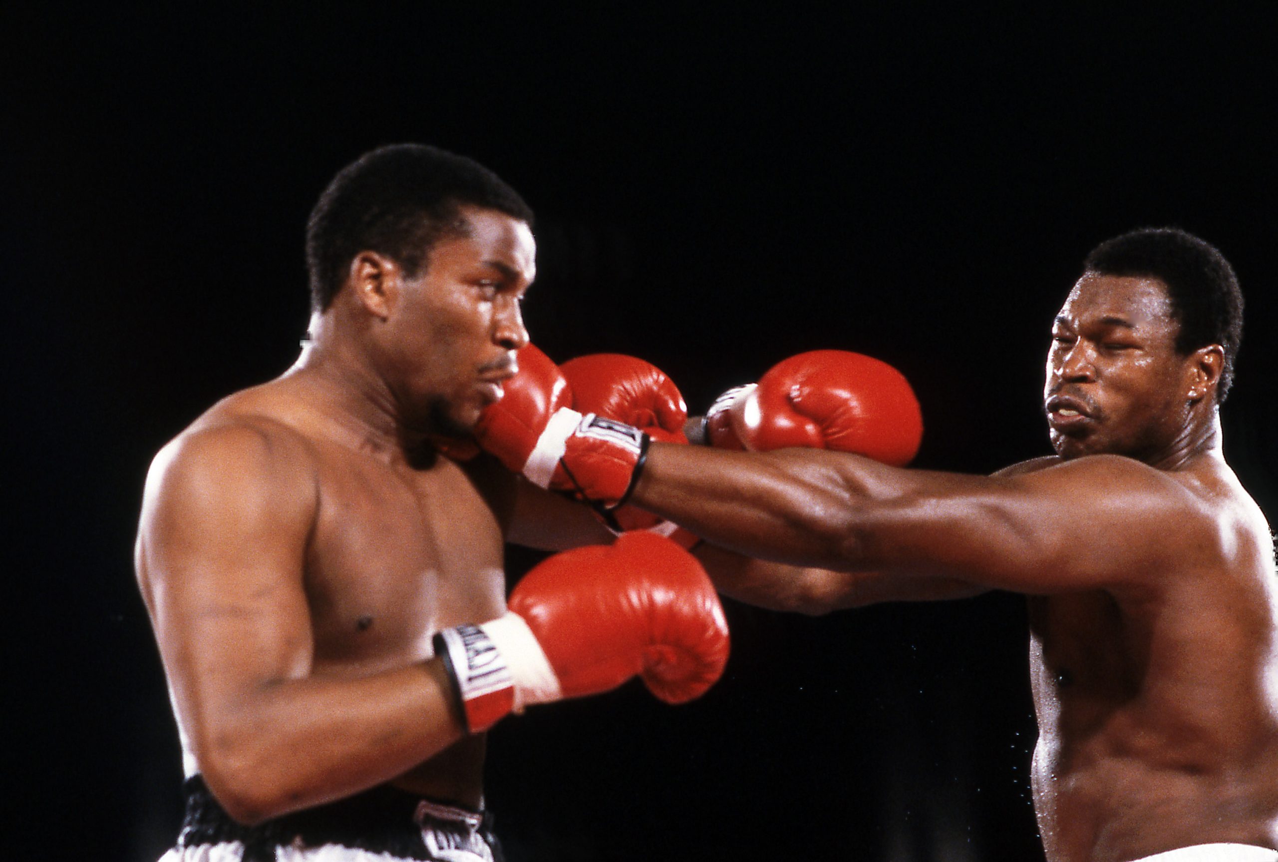 (L-R) Tim Witherspoon, Larry Holmes boxing at Dunes, May 20, 1983.