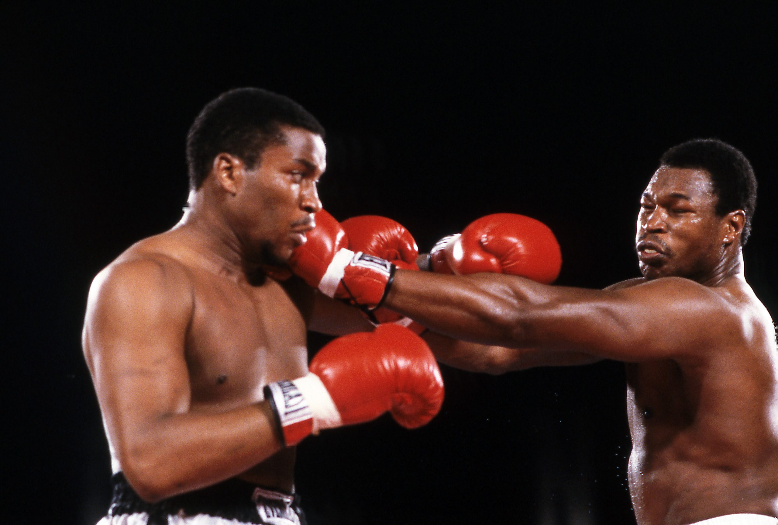 (L-R) Tim Witherspoon, Larry Holmes boxing at Dunes, May 20, 1983.