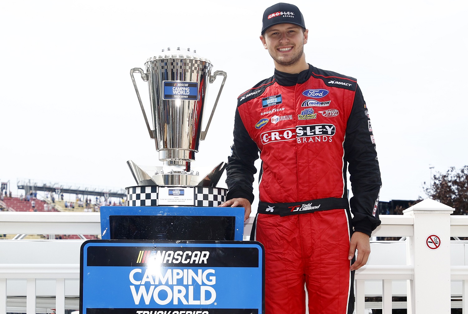 Todd Gilliland, driver of the No. 38 Ford, poses for photos after the NASCAR Camping World Truck Series United Rentals 176 at Watkins Glen International on Aug. 07, 2021.