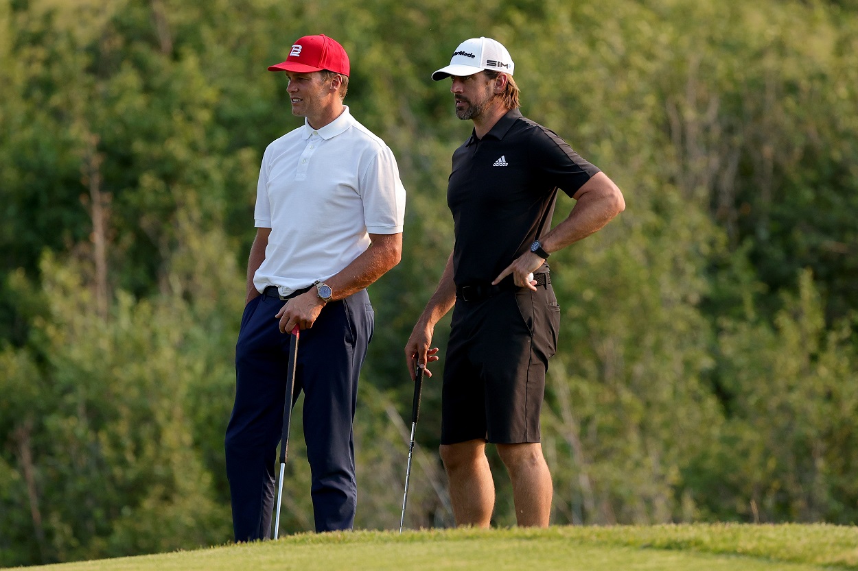 Tom Brady and Aaron Rodgers play golf.