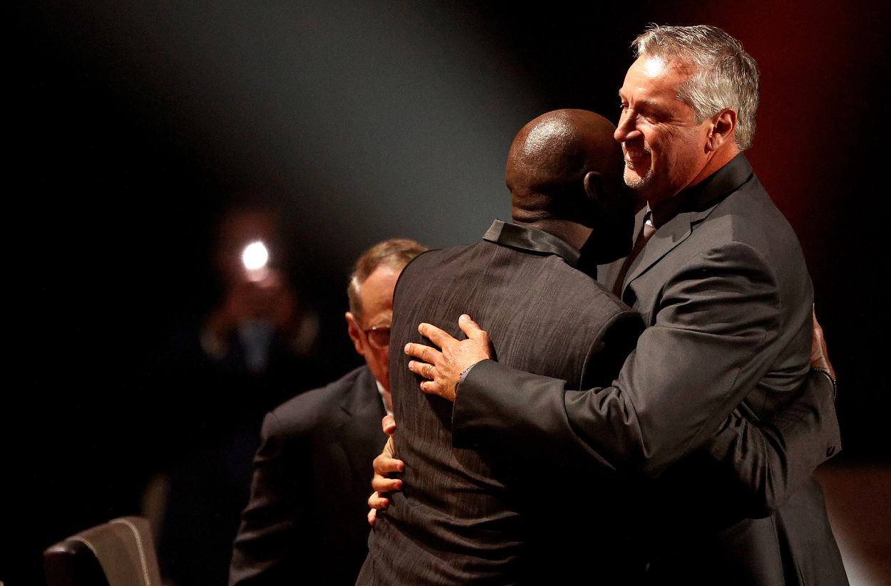 Toni Kukoc is congratulated by Michael Jordan during the 2021Naismith Memorial Basketball Hall of Fame ceremony.