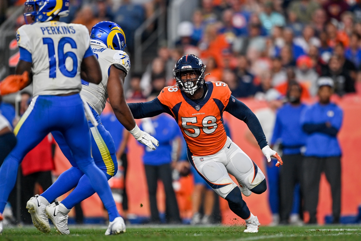 Von Miller of the Denver Broncos rushes the passer during an NFL preseason game against the Los Angeles Rams.