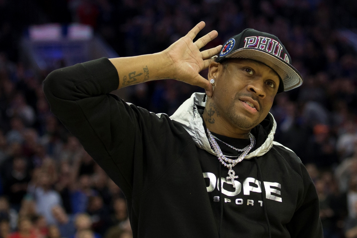 Allen Iverson listens to the crowd prior to a Philadelphia 76ers game.
