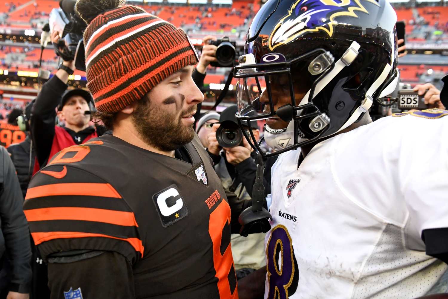 Cleveland Browns quarterback Baker Mayfield speaks with Baltimore Ravens quarterback Lamar Jackson after a game.