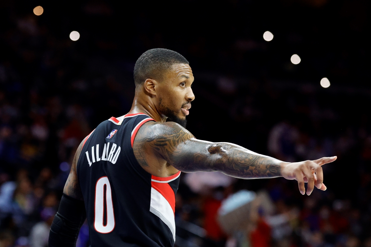 Damian Lillard of the Portland Trail Blazers motions to a teammate during a team.