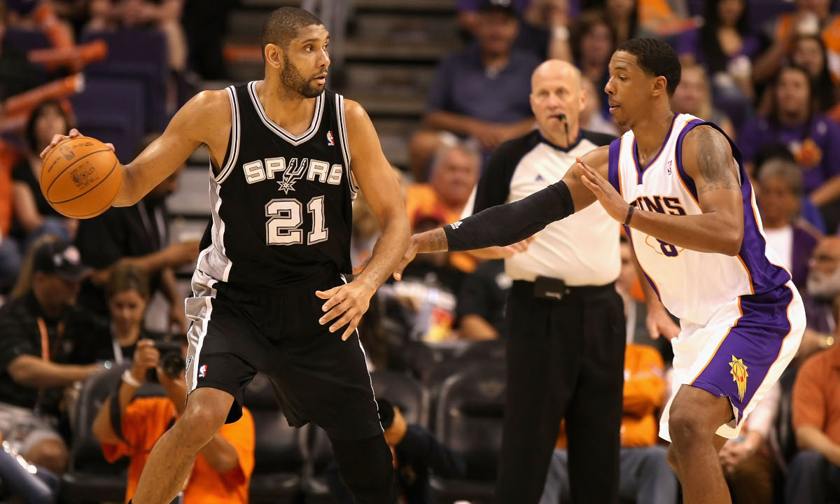 Tim Duncan battles Channing Frye, who wonders why the San Antonio Spurs Hall of Famer isn't included on more all-time top-five player lists