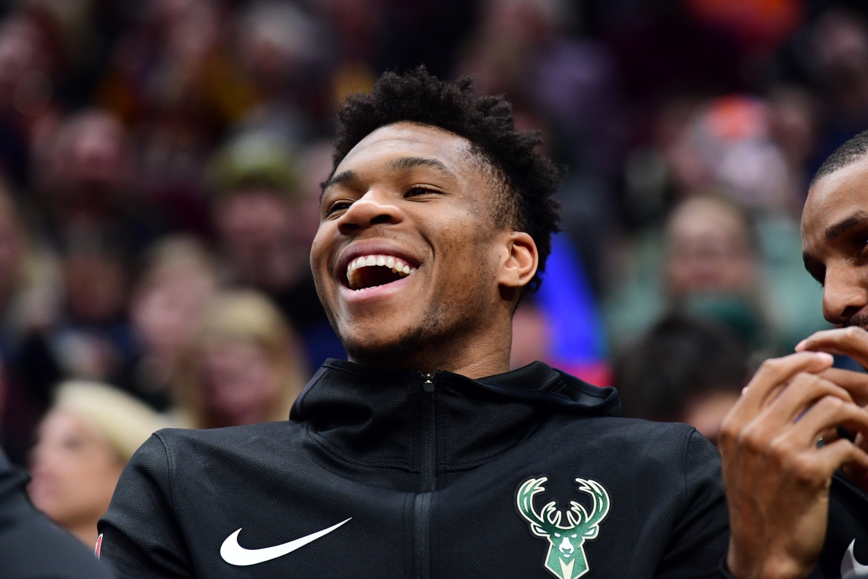 Giannis Antetokounmpo of the Milwaukee Bucks watches from the sidelines.