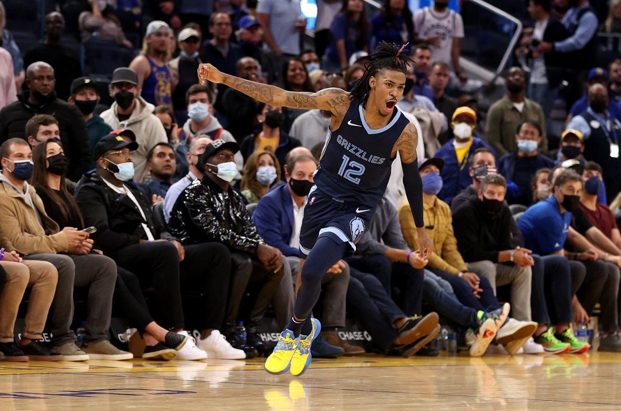 Ja Morant of the Memphis Grizzlies celebrates following a win.
