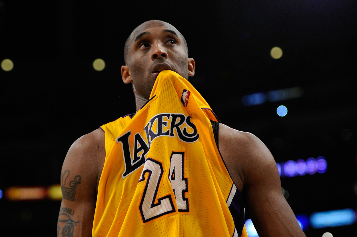 Los Angeles Lakers guard Kobe Bryant biting his jersey.