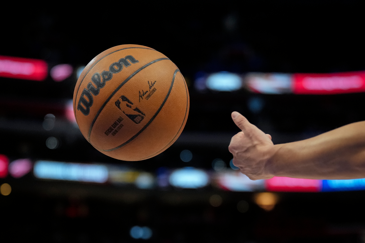 A referee throws a Wilson brand NBA basketball during the game between the Detroit Pistons and Miami Heat.