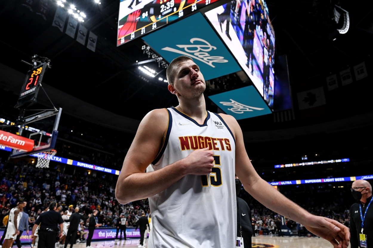 Nikola Jokic of the Denver Nuggets walks off the floor following his ejection during a game against the Miami Heat.