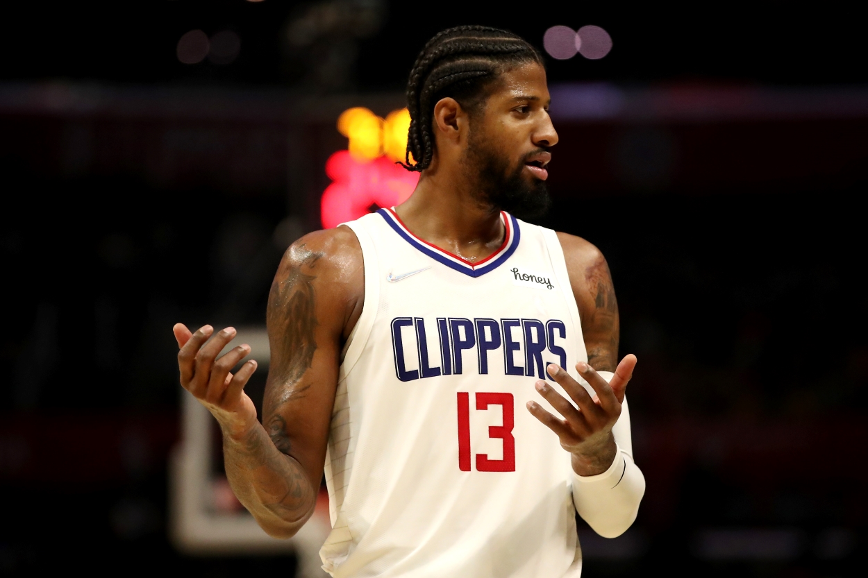 Paul George of the Los Angeles Clippers reacts to a play during a game against the Charlotte Hornets.