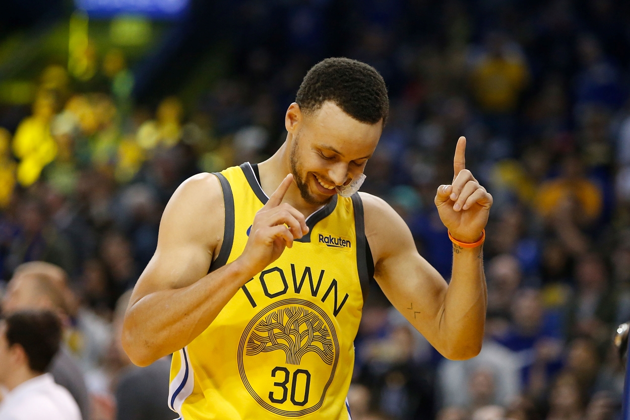 Steph Curry of the Golden State Warriors dances during a game.
