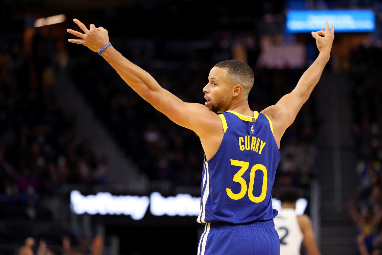Stephen Curry of the Golden State Warriors, who now owns another NBA shooting stat, celebrates after a 3-point basket.