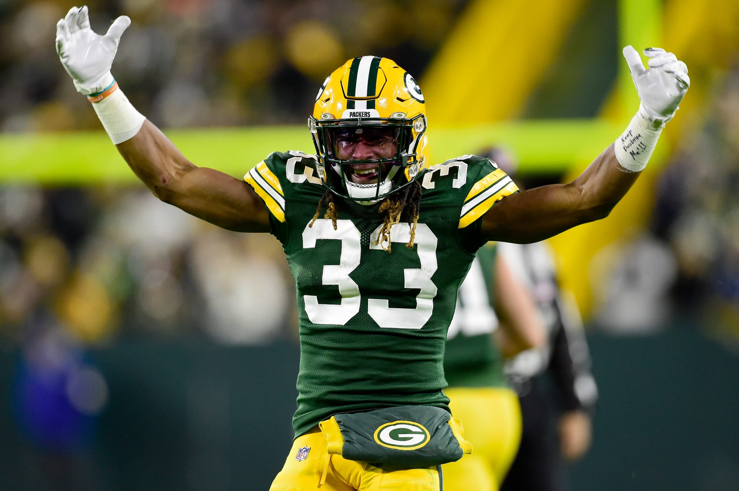 Aaron Jones of the Green Bay Packers celebrates after a first down.