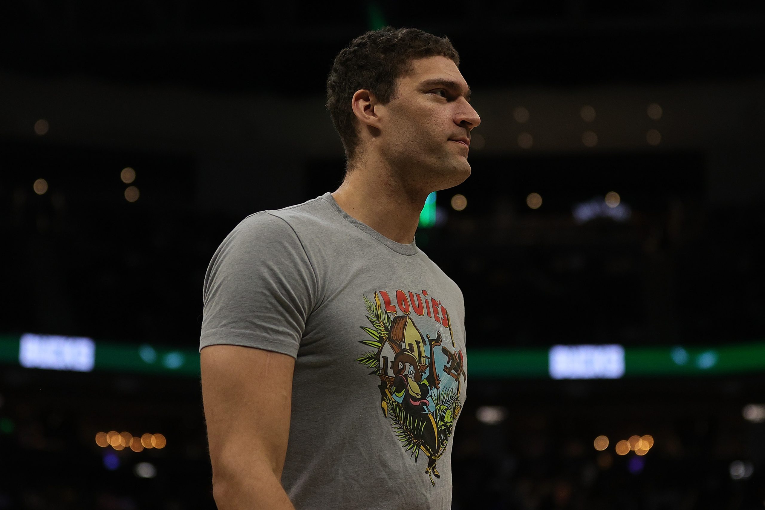 Brook Lopez of the Milwaukee Bucks walks to the bench.