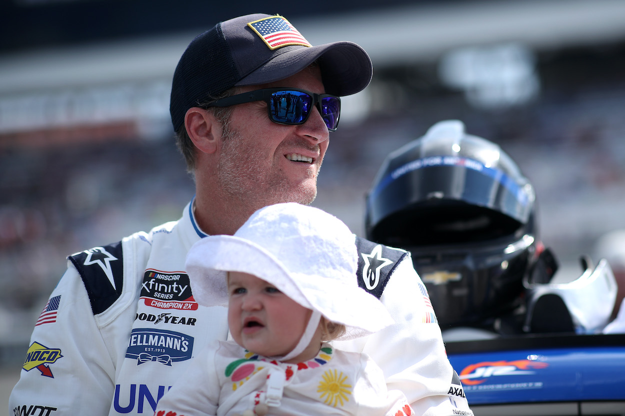 Dale Earnhardt Jr. holds daughter before race