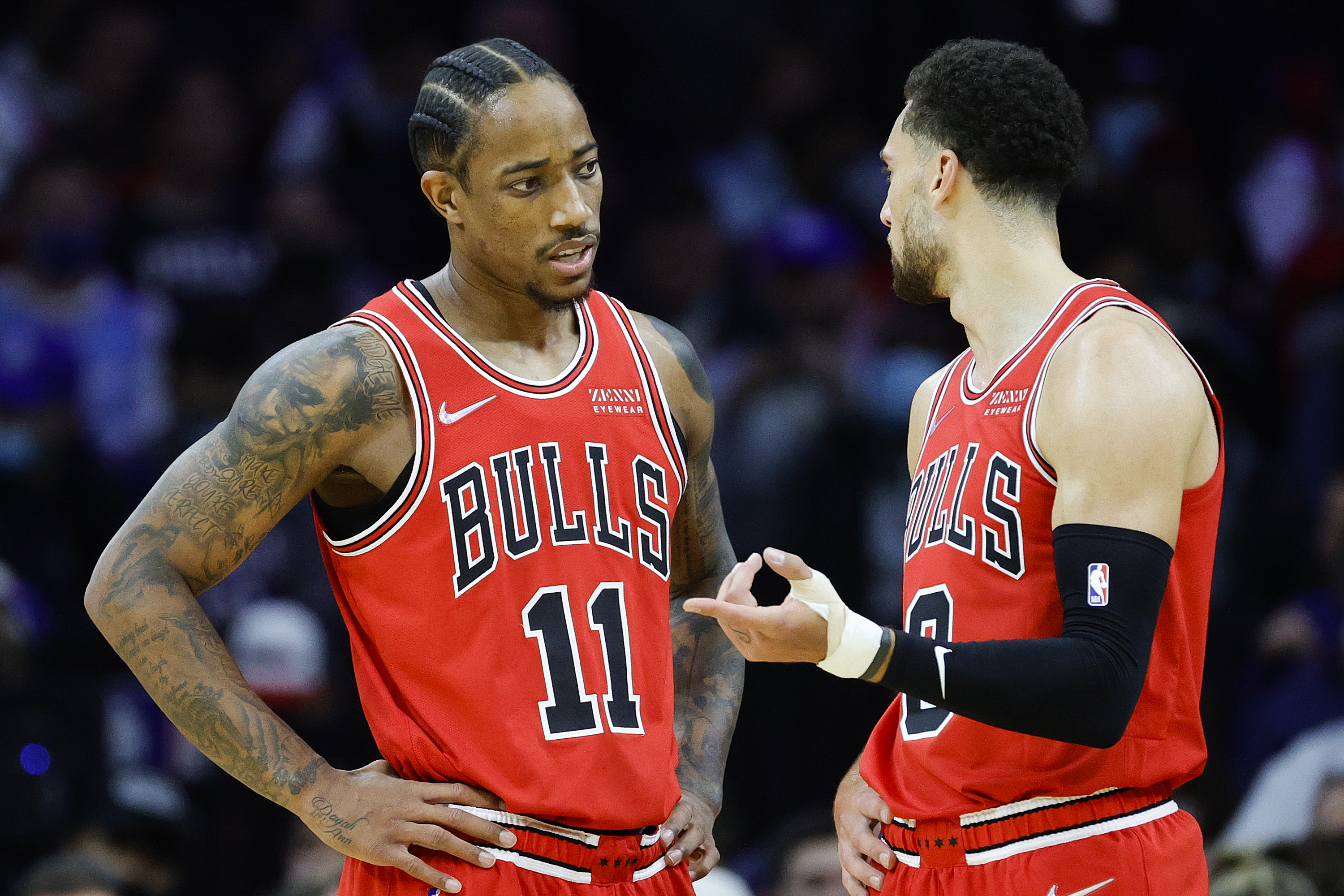 Chicago Bulls stars DeMar DeRozan and Zach LaVine talk during an NBA game against the Philadelphia 76ers in November