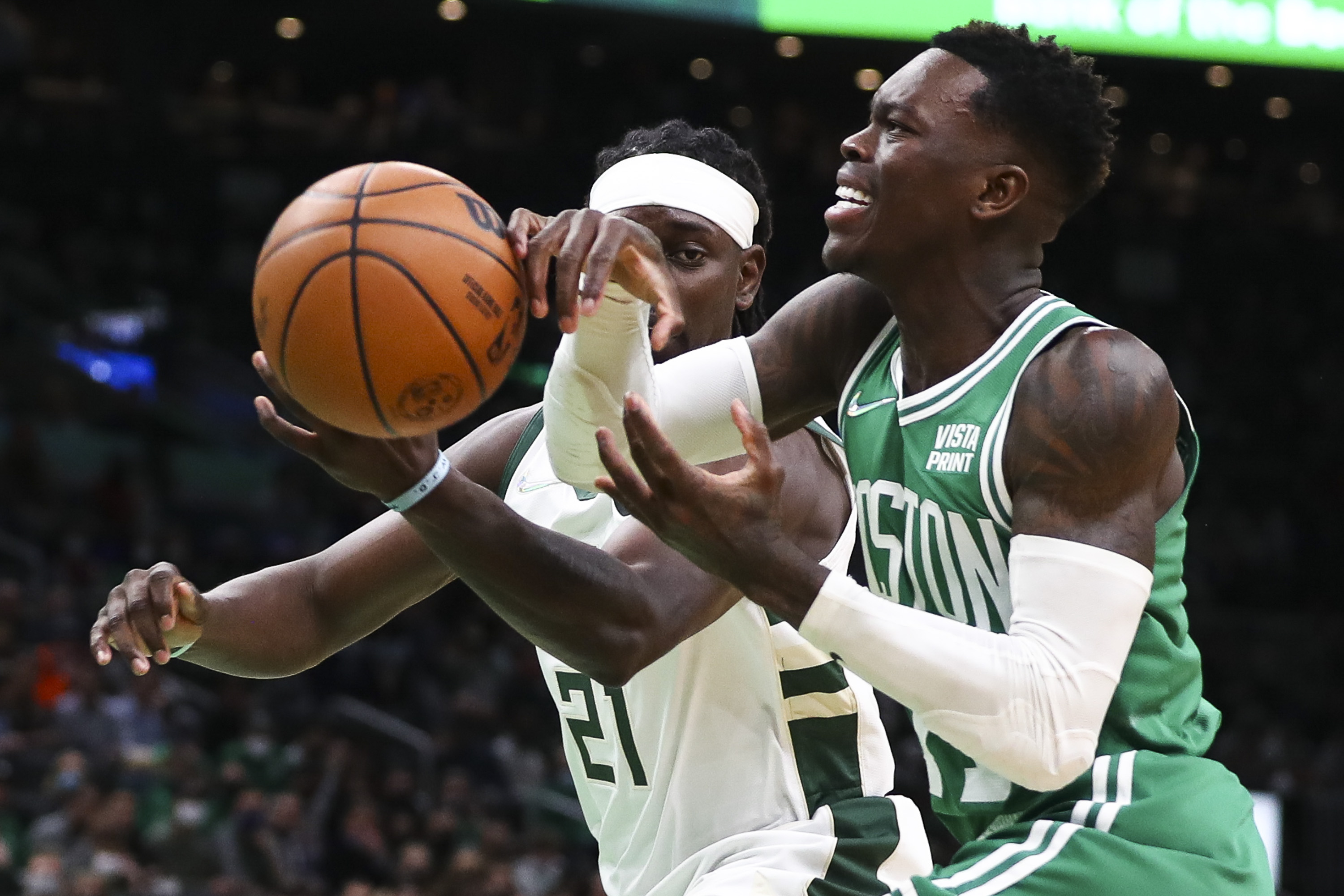 Boston Celtics point guard Dennis Schroder drives to the rim during a game against the Milwaukee Bucks
