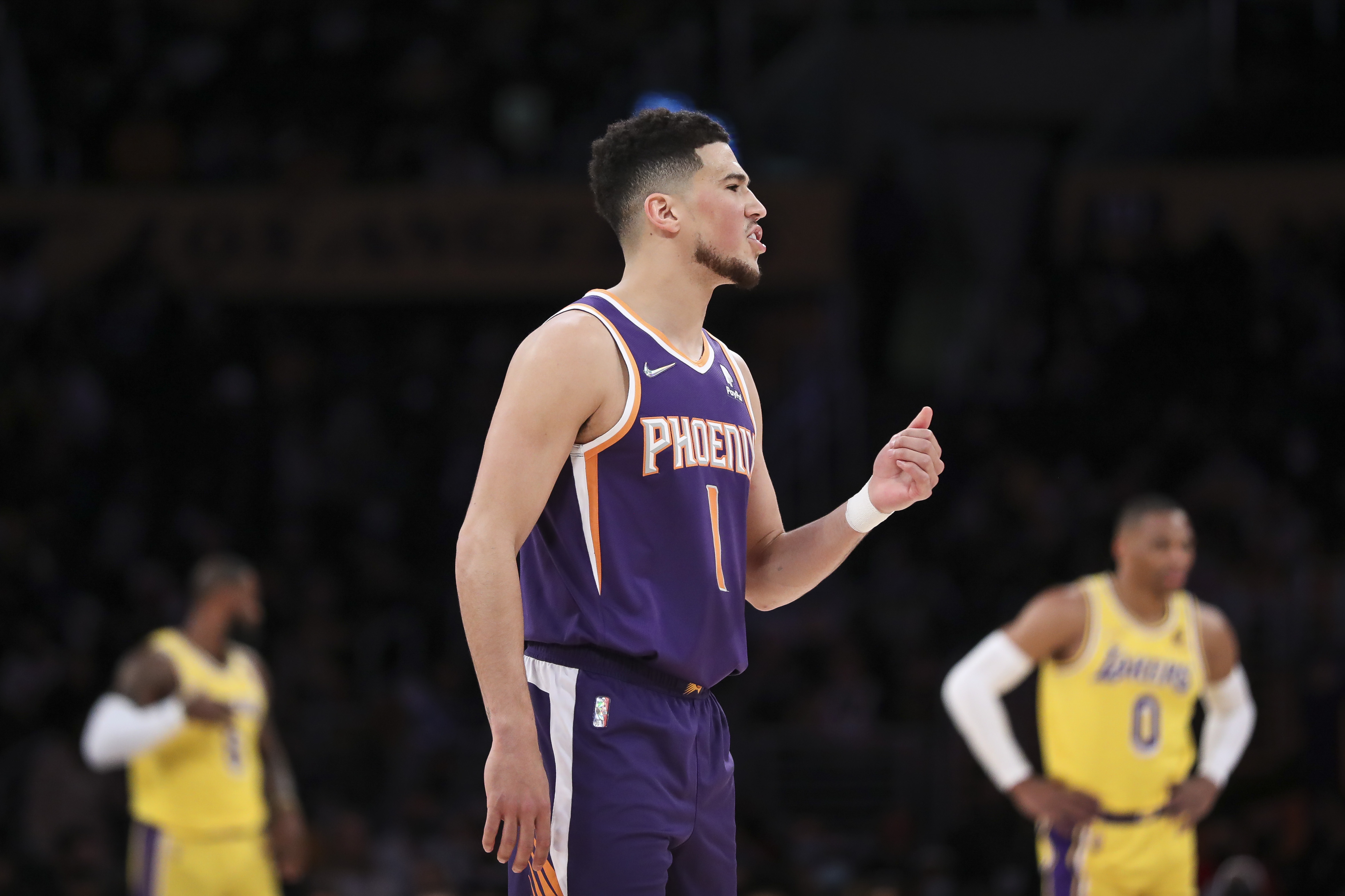 Phoenix Suns star Devin Booker reacts during a game against the Los Angeles Lakers