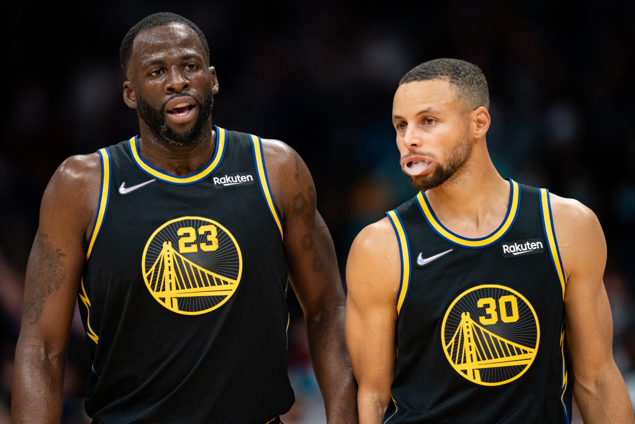 Golden State Warriors stars Draymond Green and Stephen Curry in 2021.