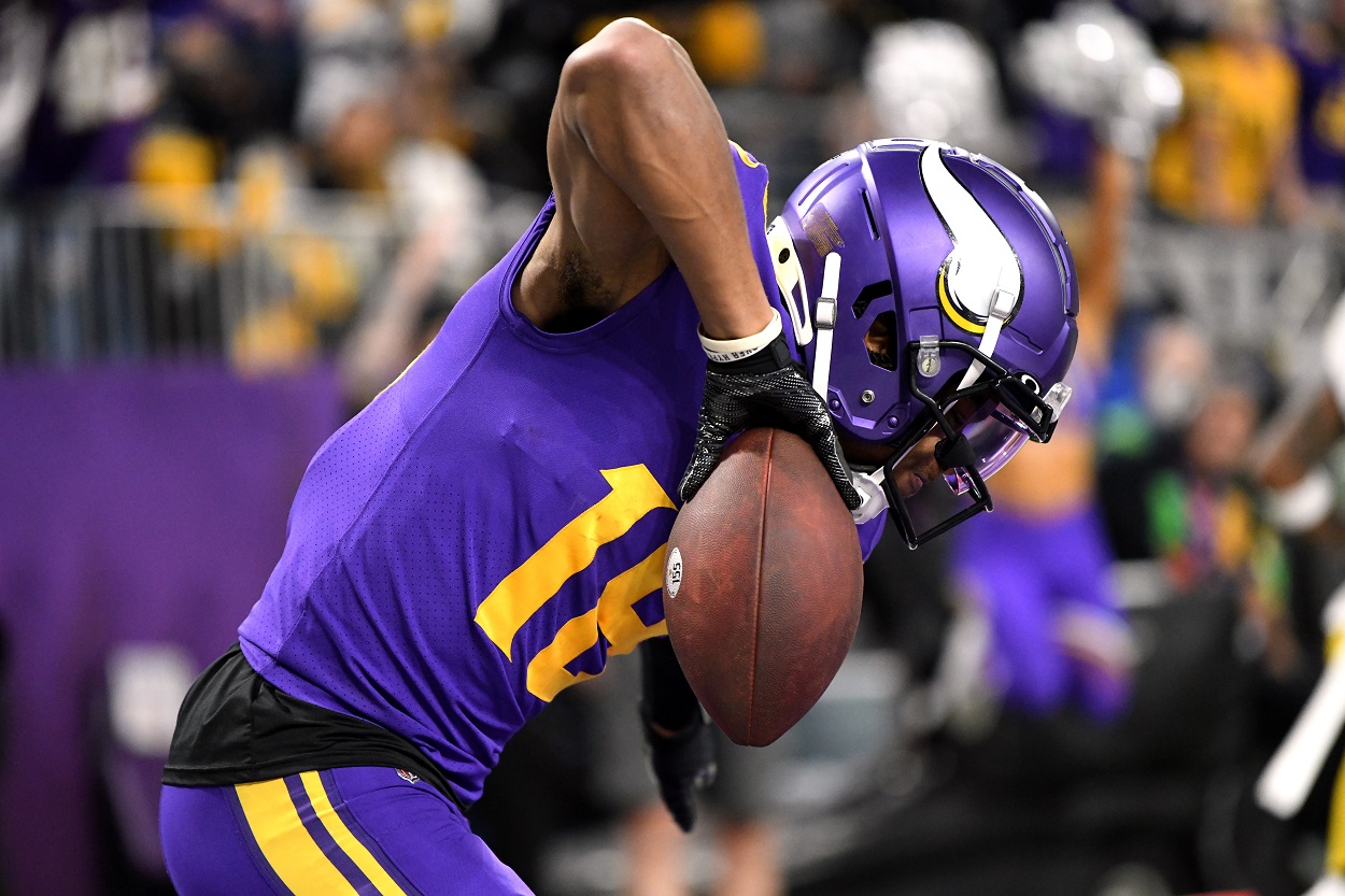 Justin Jefferson scores a touchdown for the Minnesota Vikings Thursday night