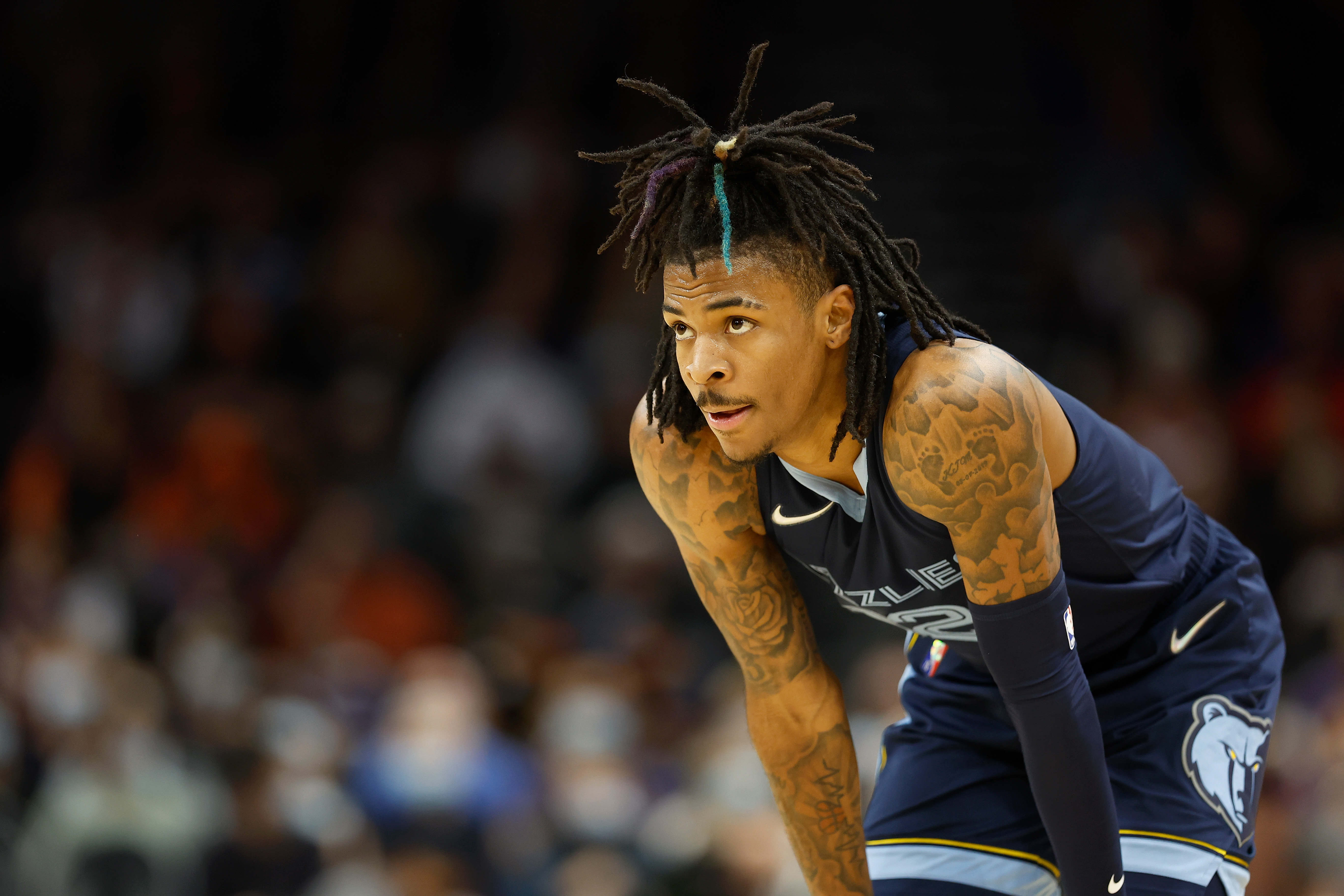 Memphis Grizzlies point guard Ja Morant looks on during a game against the Phoenix Suns