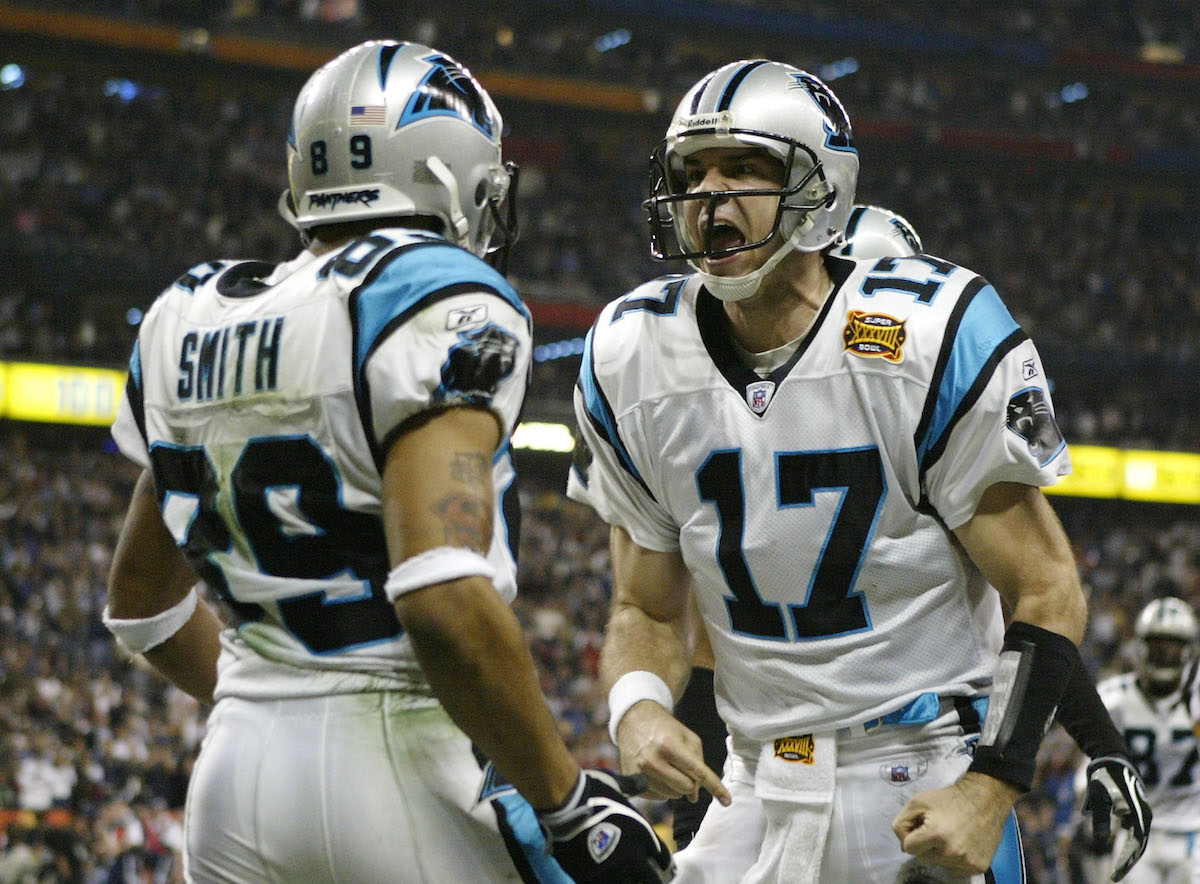 Quarterback Jake Delhomme of the Carolina Panthers celebrates with Steve Smith after a touchdown pass during Super Bowl XXXVIII