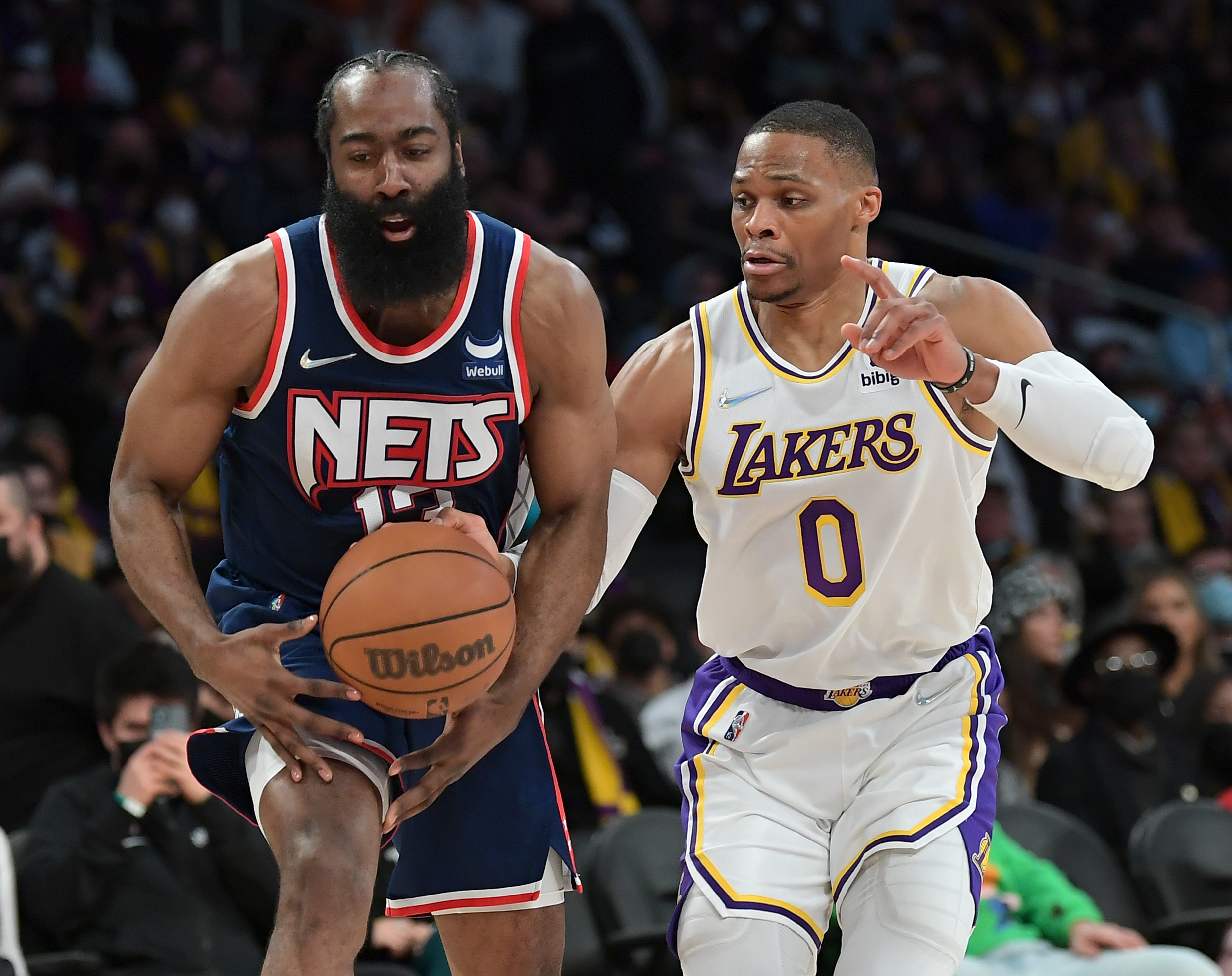 Brooklyn Nets star James Harden drives against Los Angeles Lakers guard Russell Westbrook