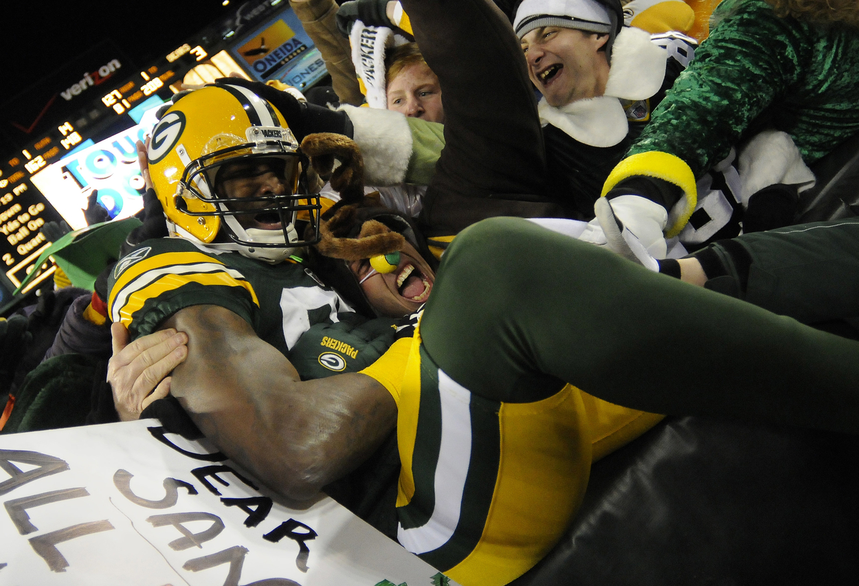James Jones celebrates a touchdown with Green Bay Packers fans on Dec. 25, 2011, the last time the team played on Christmas Day.