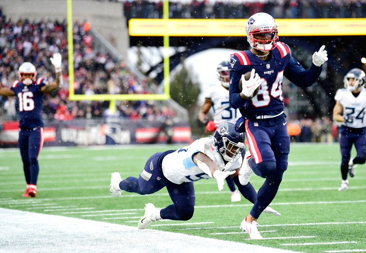 Kendrick Bourne #of the New England Patriots runs after the catch.