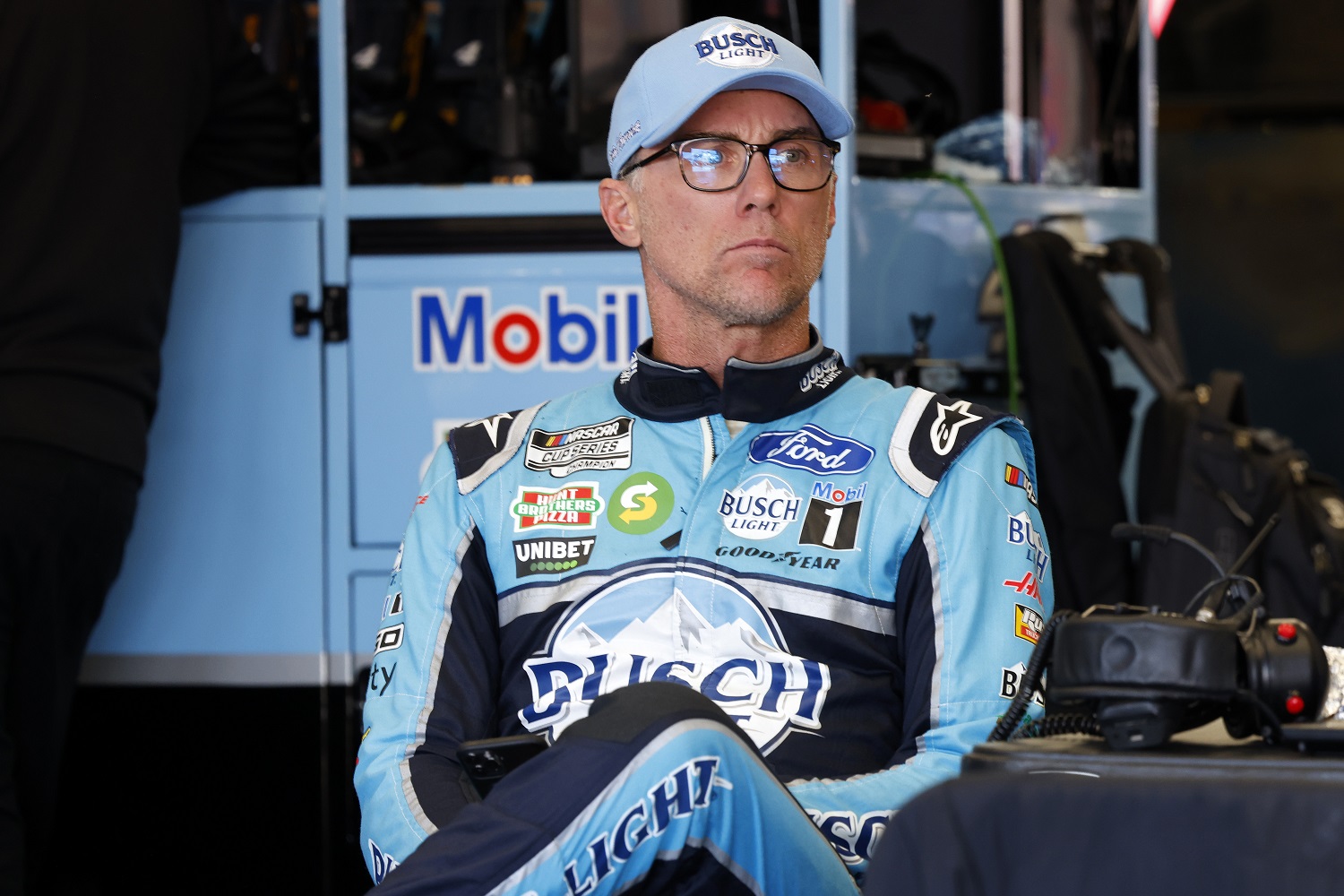 Kevin Harvick waits in the garage area during  NASCAR Cup Series Next Gen testing at Charlotte Motor Speedway on Nov. 17, 2021, in Concord, North Carolina. | Grant Halverson/Getty Images