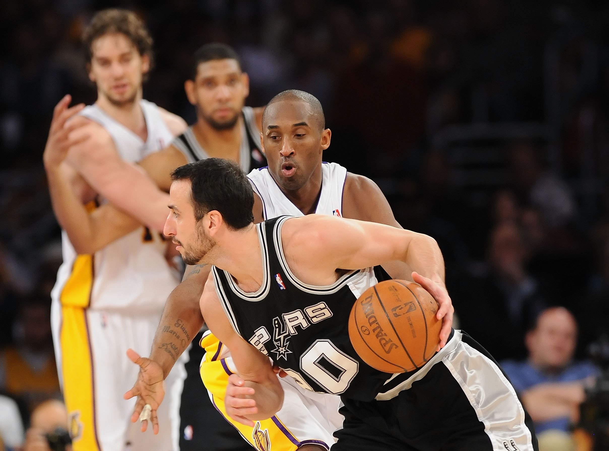 Los Angeles Lakers legend Kobe Bryant guards former San Antonio Spurs star Manu Ginobili during a game in January 2009